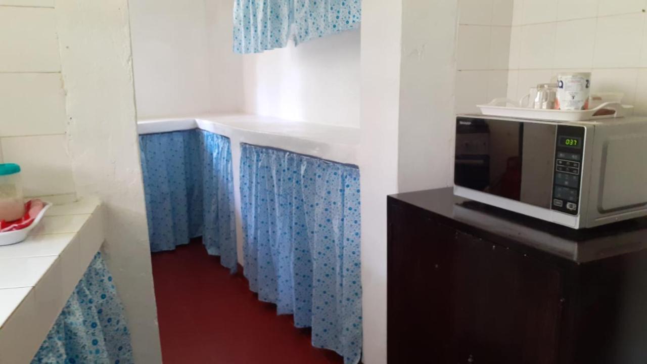 Les Datchi Cottages Diani Beach Extérieur photo