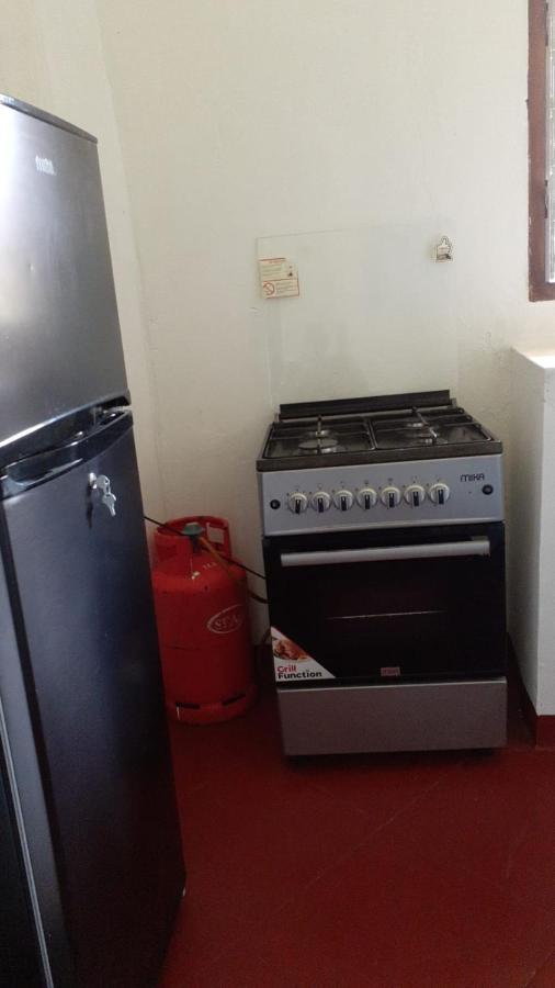 Les Datchi Cottages Diani Beach Extérieur photo